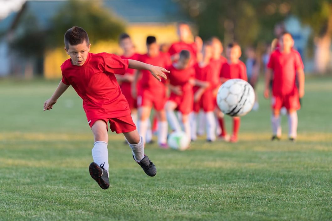 kids soccer match on field